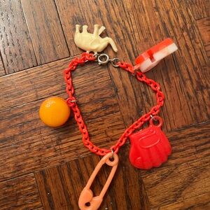 vintage 1980s red plastic charm bracelet